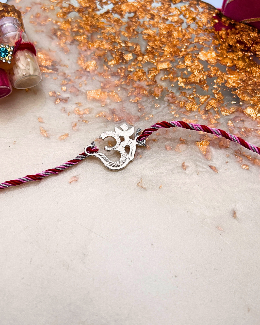 Silver "Om" Rakhi